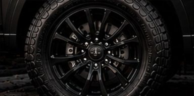 All-terrain wheel and tire